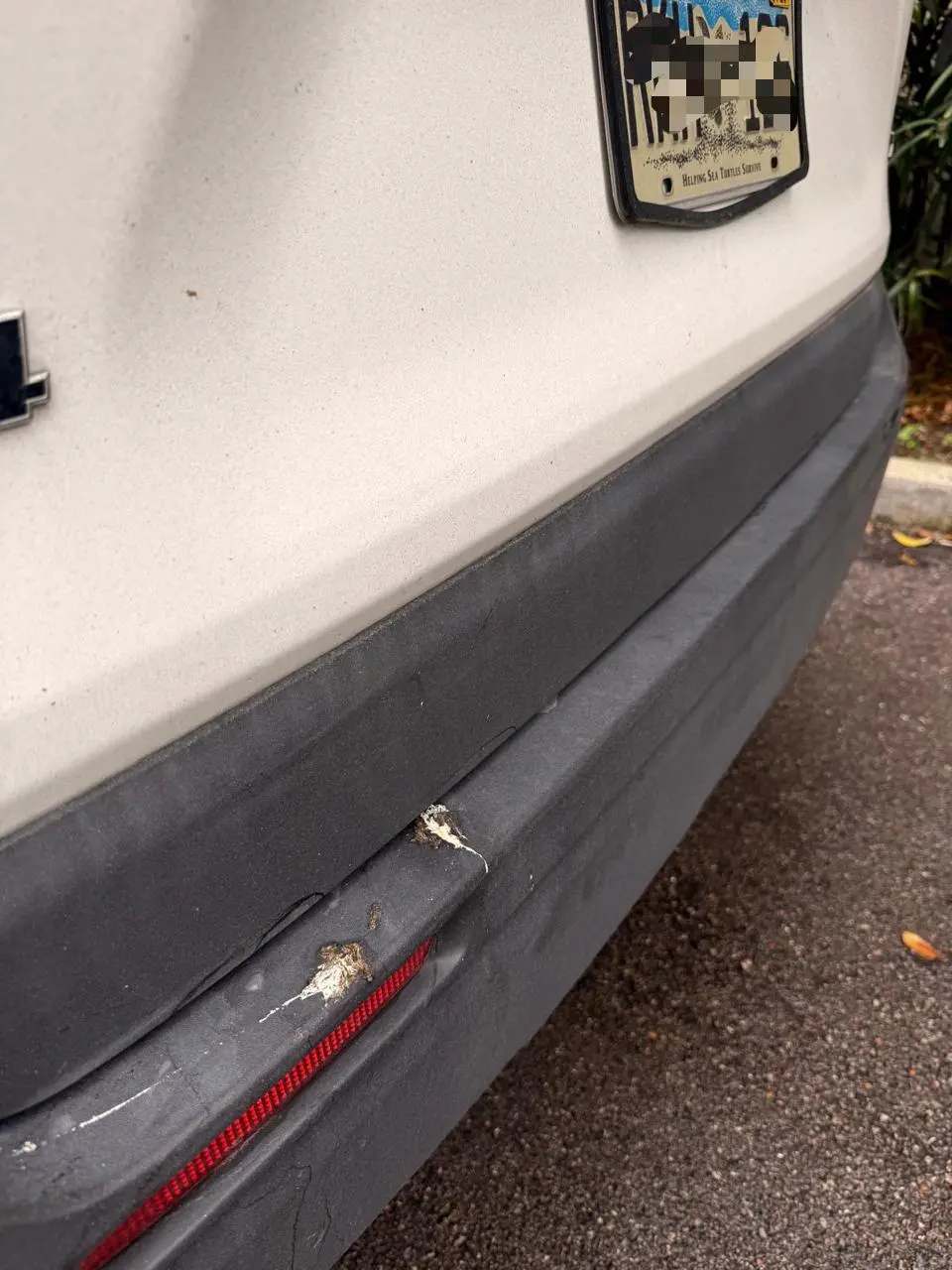 Before and after trim restoration on Toyota RAV4 rear bumper in Fort Lauderdale — faded trim restored by Route95 Mobile Car Detailing