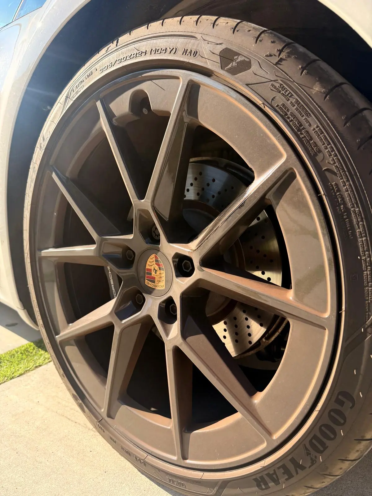 Before and after rim detail on Porsche 911 in Fort Lauderdale — professional wheel cleaning by Route95 Mobile Car Detailing